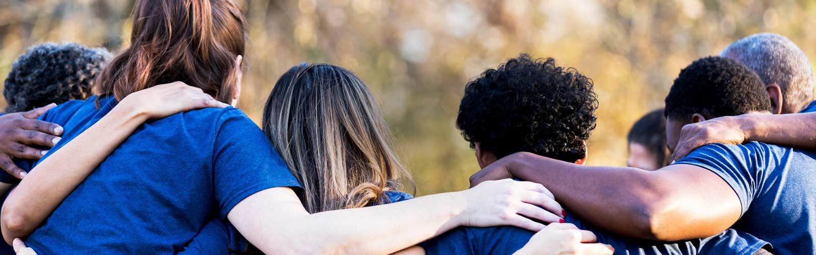 Volunteers in a huddle 